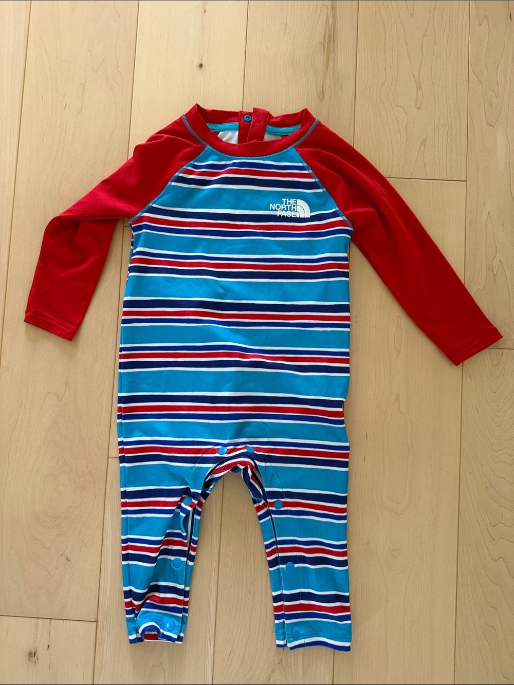 The North Face UPF 40 Blue & Red Striped Kids Rashguard One-Piece